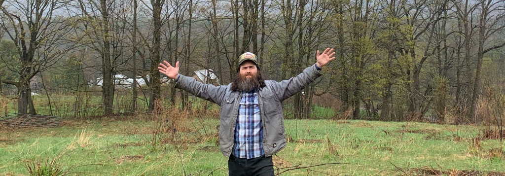 Dipshit standing in the woods